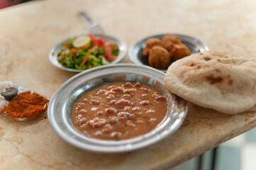 Mashed fava beans known as Fuul, Traditional Egyptian street food, Cairo, Egypt..