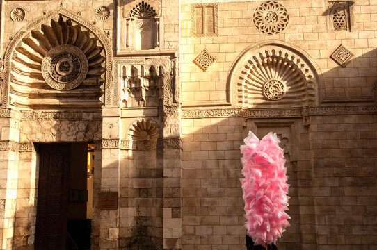 Cotton Candy Seller outside the Al Aqmar Mosque, Sharia Moez al Din Allah, near the famous Khan el Khalili Bazaar, Cairo, Egypt. .