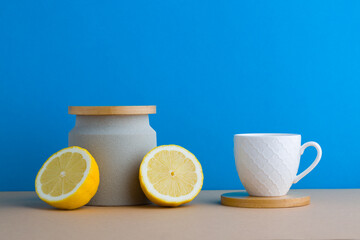 A front view of lemon decorated with tea