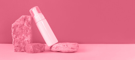 White blank cosmetic bottles, dried herbs on stone podiums. Natural skin care SPA beauty product design. Mineral organic cosmetics Mock-Up. Beige background. Face and body treatment. Front View