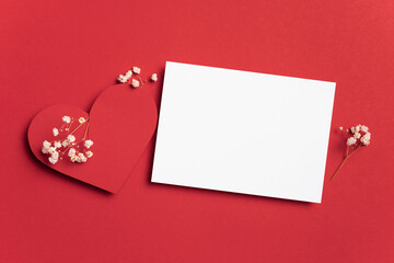 Valentines day card mockup and red heart on paper background