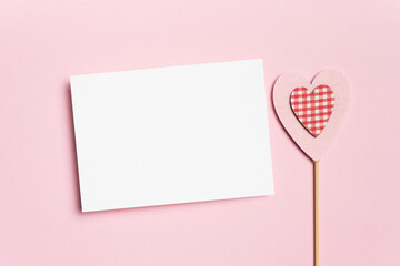 Fototapeta na wymiar Blank Valentines Day greeting card mockup on pink background