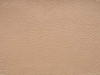 Beige or light brown color luxury genuine leather. Skin natural with design lines pattern or abstract background. Use as wallpaper or backdrop luxury event. Genuine leather texture. Faux eco leather.