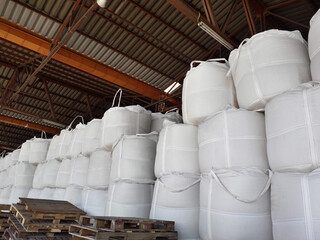 Chemical fertilizer The product stock is packed in sacks, stacked in the warehouse, waiting for...