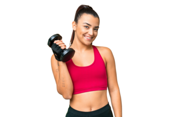 Young sport woman making weightlifting smiling a lot
