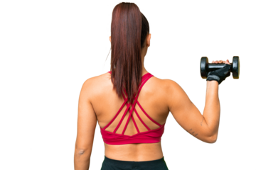 Young sport woman making weightlifting in back position