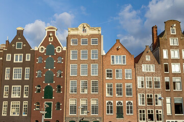 Fototapeta na wymiar Example of Dutch architecture. Houses in Amsterdam. Netherlands. Horizontally. 