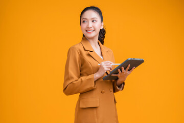 casual smart asian female business woman hand using tablet business management schedule smiling...