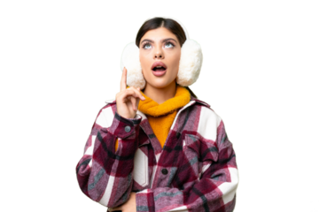 Young Russian woman wearing winter muffs over isolated chroma key background thinking an idea pointing the finger up