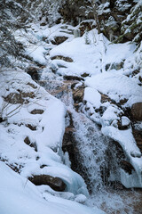 Fototapeta na wymiar Snowy Waterfall - White Mountains - New Hampshire