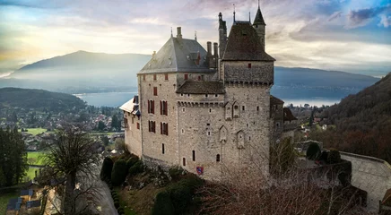 Gordijnen Most beautiful medieval castles of France - fairytale Menthon located near lake Annecy. aerial view © Freesurf