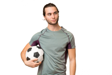 Young handsome football player man over isolated background looking to the side