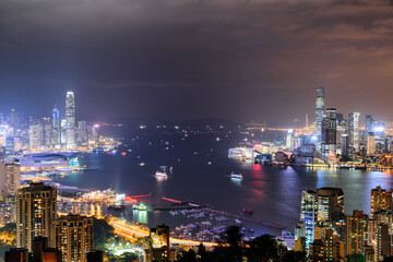 Gorgeous night aerial view of Victoria Harbor and Hong Kong