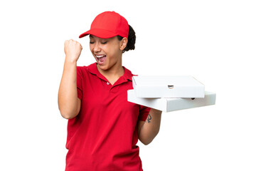 pizza delivery woman with work uniform picking up pizza boxes over isolated chroma key background celebrating a victory