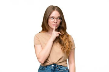 Young pretty woman over isolated background showing a sign of silence gesture putting finger in mouth