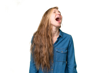 Naklejka premium Young blonde woman over isolated background laughing