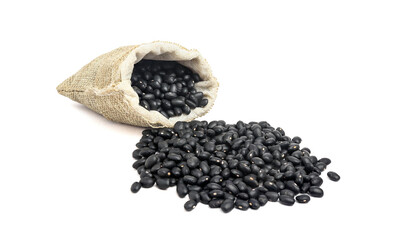 Black beans in burlap isolated on white background
