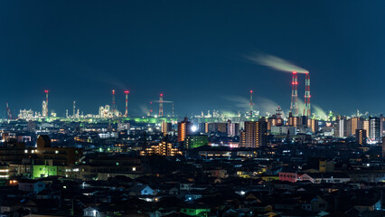 Fototapeta na wymiar The petrochemical complex at Yokkaichi Port, Yokkaichi city, Mie prefecture, Japan at night