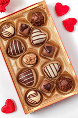 Delisious chocolate pralines and red heart for Valentine's Day.