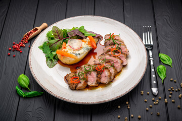 Plate with duck breast and pear, duck L'Orange
