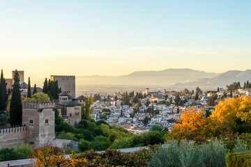 Obraz premium Sunset over ancieat arabic Alhambra in Granada, Spain on November 26, 2022 