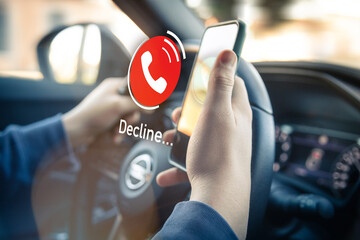 Teenager receiving a phone call during driving a car. Security, technology, communication concept.