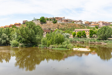 Fototapeta na wymiar Pisuerga river with a view to Simancas town, province of Valladolid, Castile and Leon, Spain