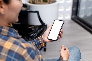 cell phone blank white screen mockup.hand holding texting using mobile on desk at office.background empty space for advertise.work people contact marketing business,technology