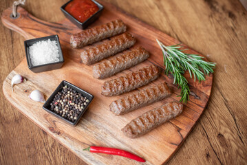 Grilled kebab with spices on a rustic background