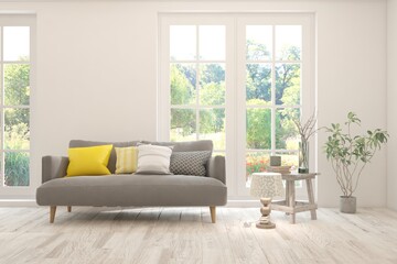 White living room with sofa and summer landscape in window. Scandinavian interior design. 3D illustration