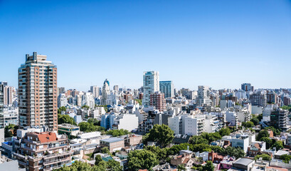 View of Buenos Aires from above. Cityscape architecture, houses and roofs of areas of Buenos Aires, Argentina.