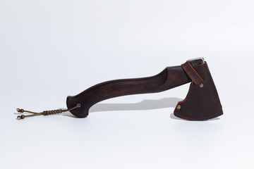 Handmade axe with wooden handle on white background.