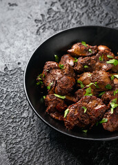Fried chicken liver, poultry meat food with herbs