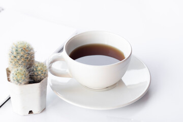 cup of coffee and cactus