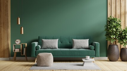 Wall mockup in dark tones with green sofa and decor in living room.
