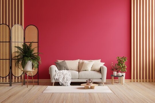 Livingroom in trend viva magenta wall background mockup with sofa furniture and decor.
