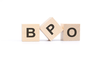 BPO - acronym from wooden blocks with letters, Business Process Outsourcing concept, top view on white background