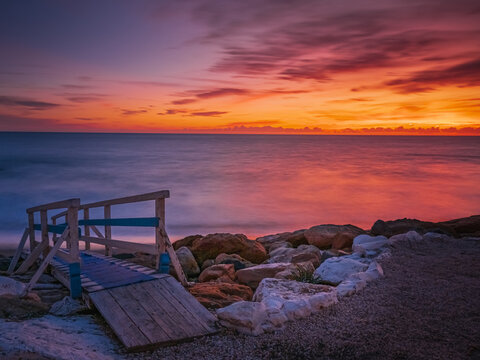 Sea sunset with pink color in Ladispoli, Rome 