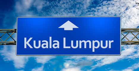 Road sign indicating direction to the city of Kuala Lumpur