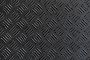 Metal floor plate with diamond pattern