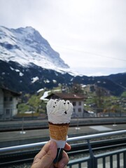 A winter eating ice cream in the Swiss Alps