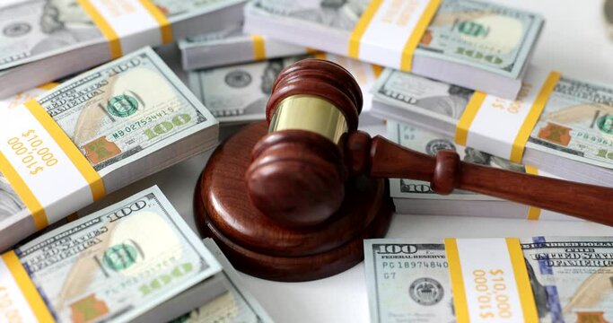 American dollar with judge wooden gavel