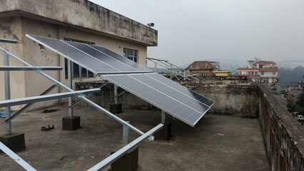 Solar panel module installation work on the old building rooftop 