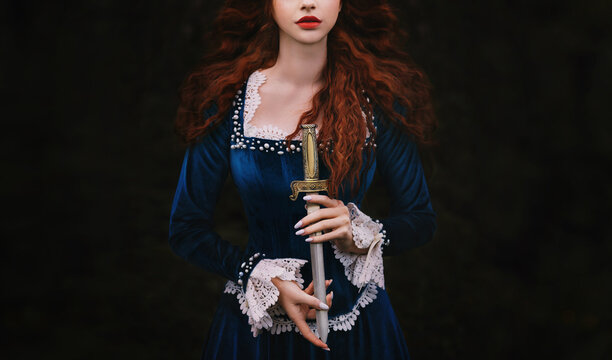 Fantasy woman warrior on black background, lady with red lips, long hair hands close up holding dagger, knife short sword. Girl gothic princess witch. Vintage blue dress old style. Art cropped face 