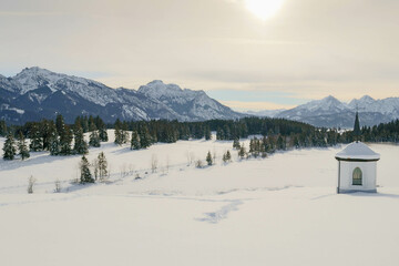 Chapel at the frozen Hegratsrieder See

