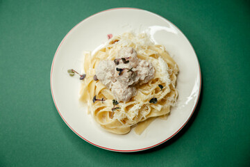 Noodles with meatballs and cheese