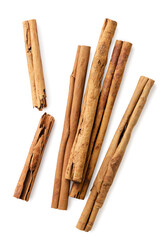 Cinnamon sticks and two halves on a white background.Top view