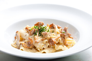 cream sauce with chanterelles served with pasta
