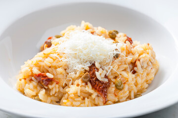 Italian risotto with dry tomatoes and capers