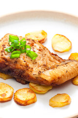 carp on cumin with fried potatoes